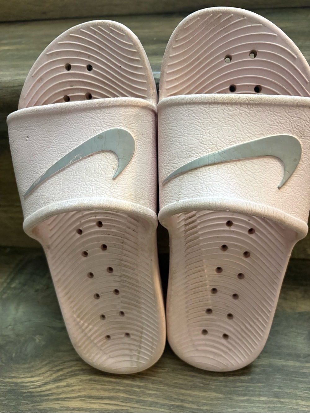Nike Women’s Pale Pink Slide Sandals with Silver Swoosh